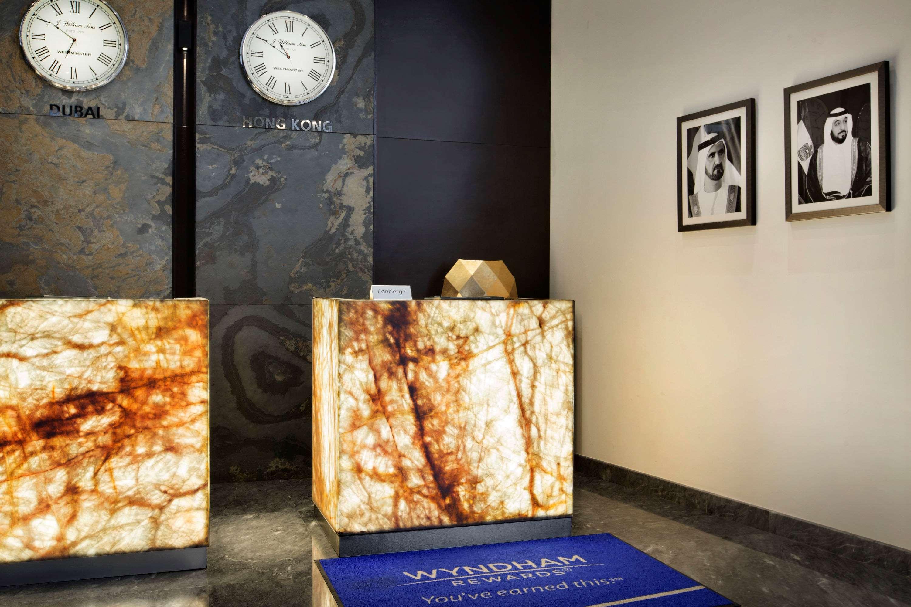 The First Collection Dubai Marina Hotel Exterior photo Reception desk with a marble finish