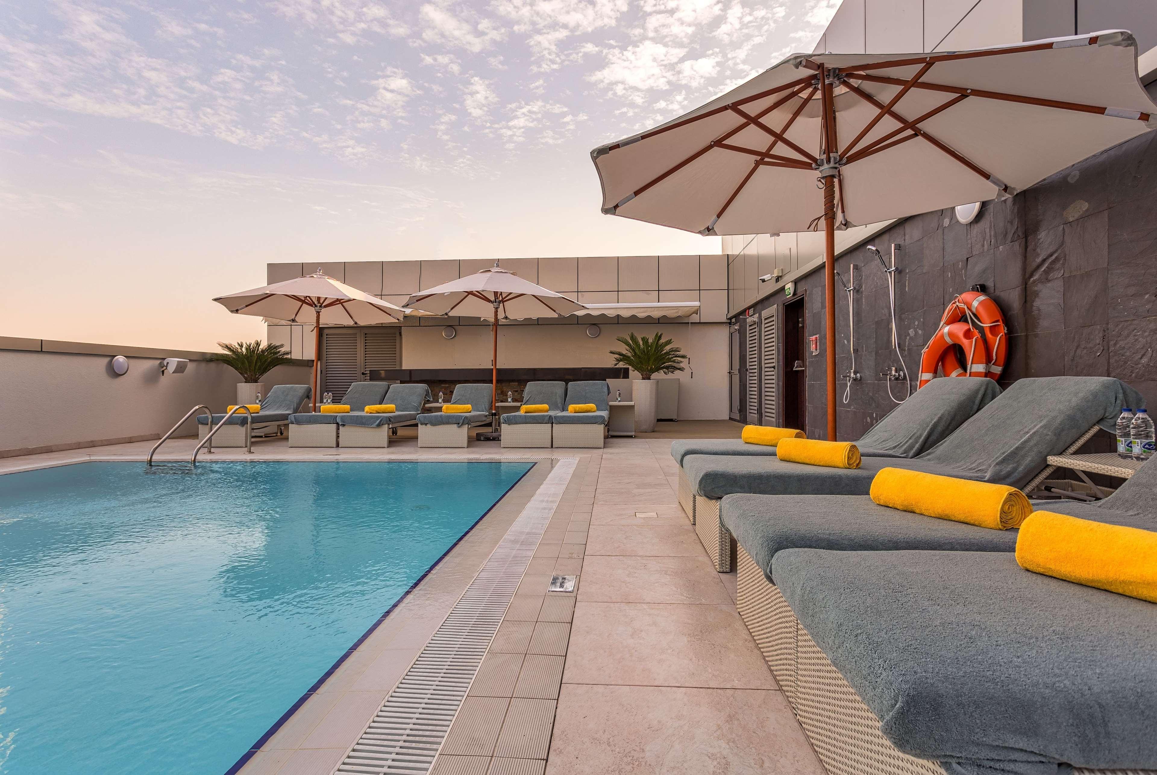 The First Collection Dubai Marina Hotel Exterior photo Swimming pool on the rooftop of the hotel