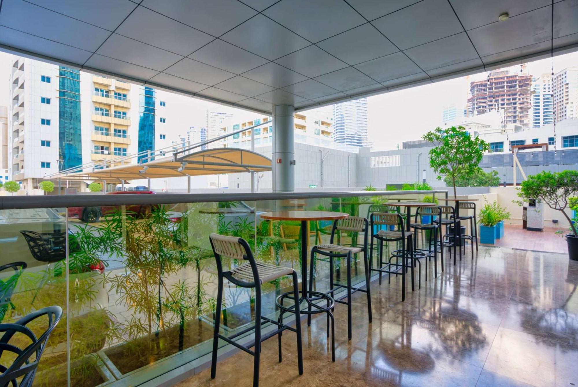 The First Collection Dubai Marina Hotel Exterior photo The terrace of the hotel
