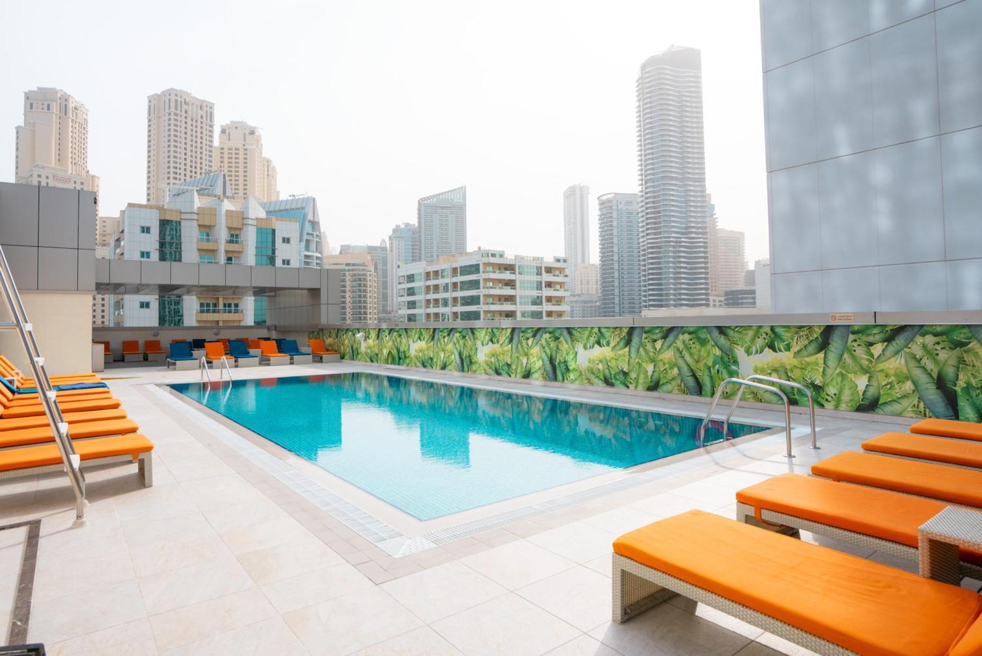 The First Collection Dubai Marina Hotel Exterior photo Swimming pool on the rooftop of the hotel